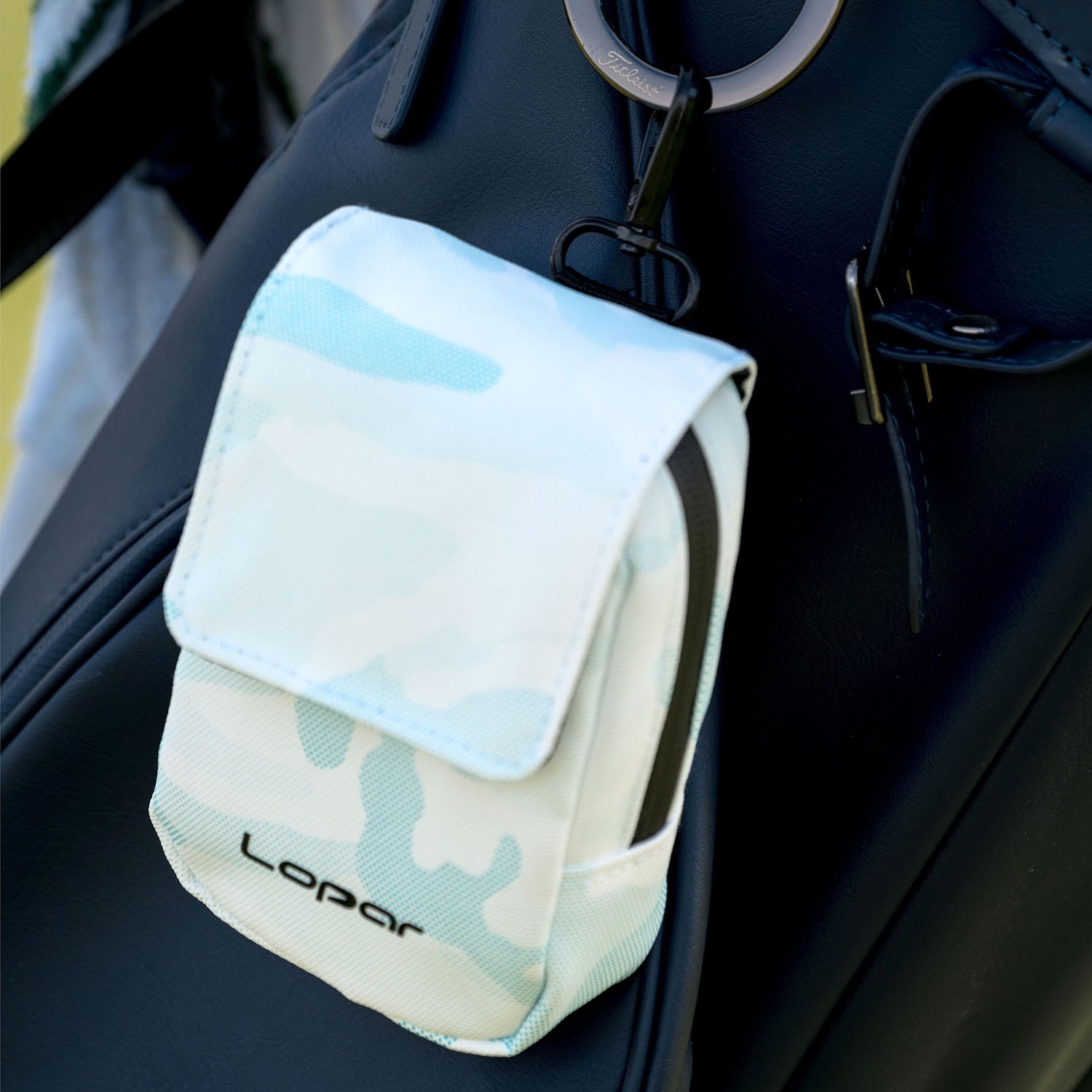 light blue rangefinder case on bag
