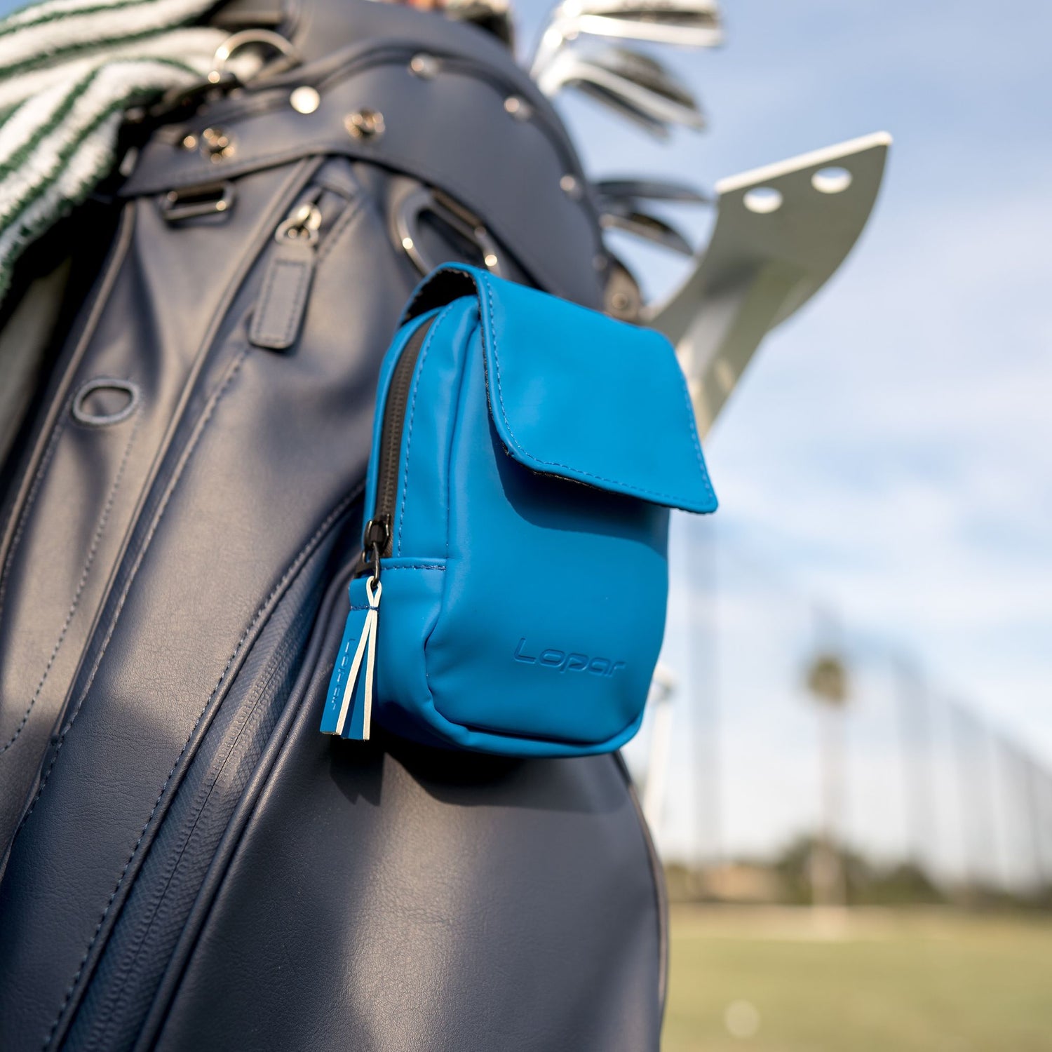 royal blue rangefinder case on golf bag