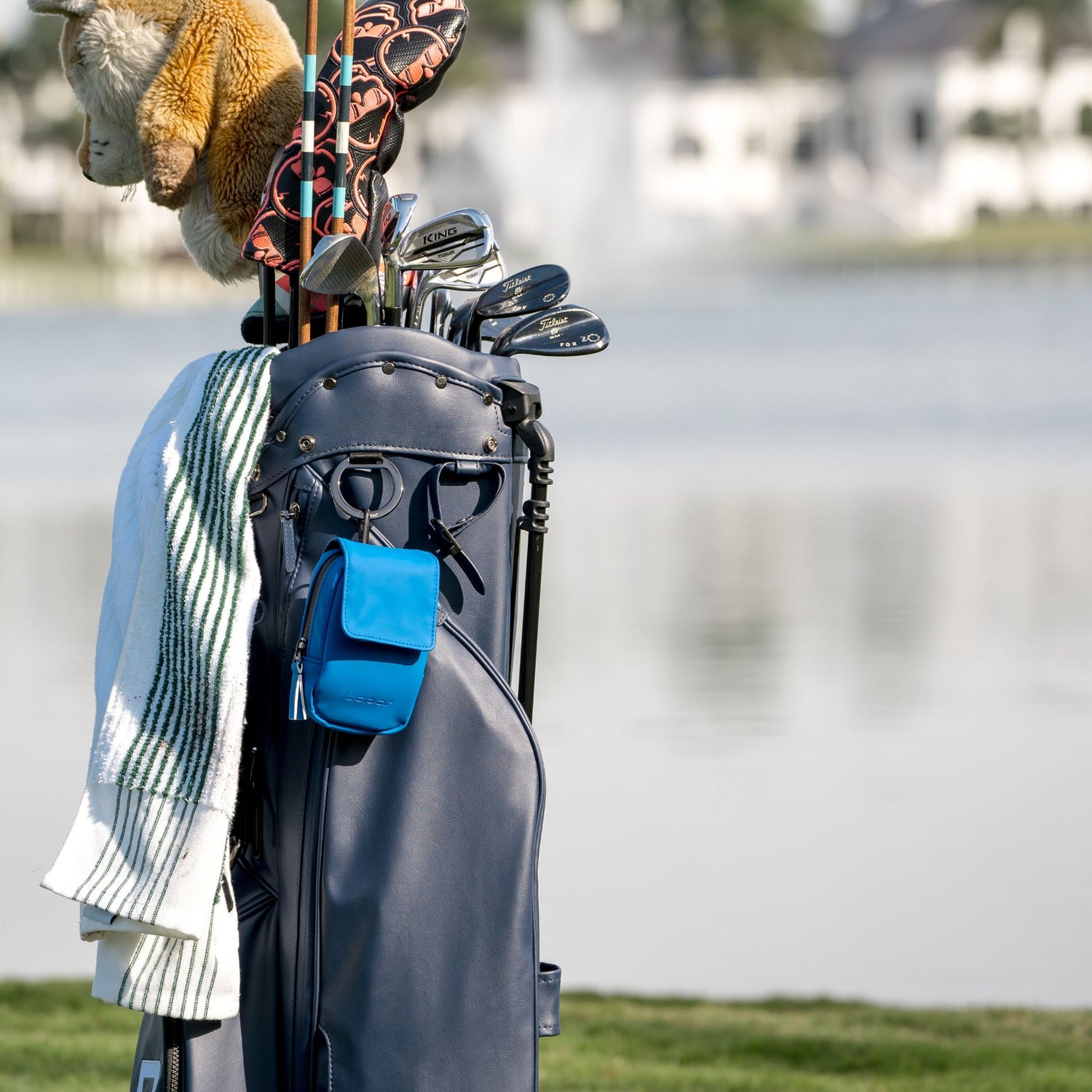 royal blue rangefinder case on golf bag in florida